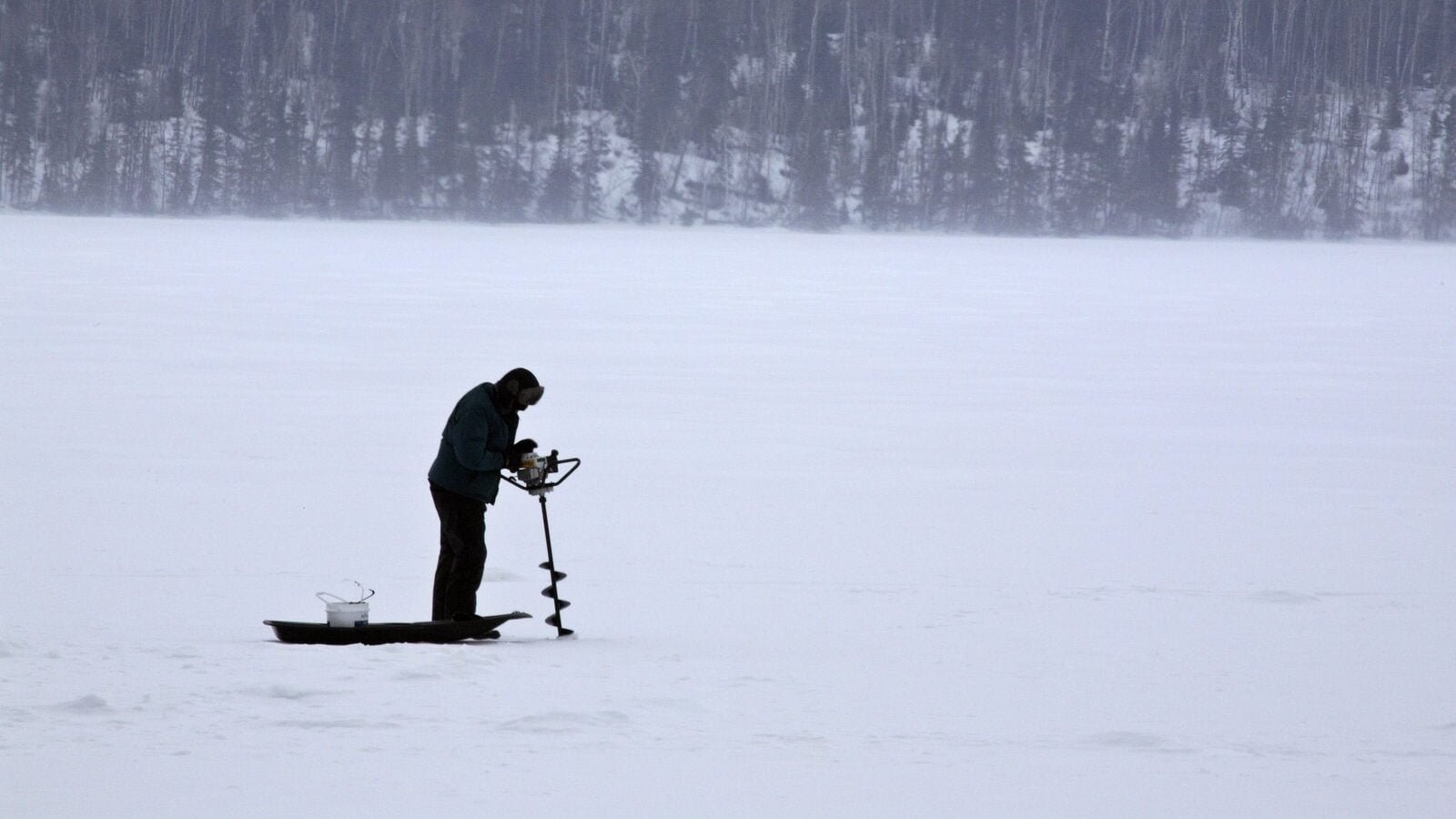 2108341 ice fisherman on waskesiu lake edited